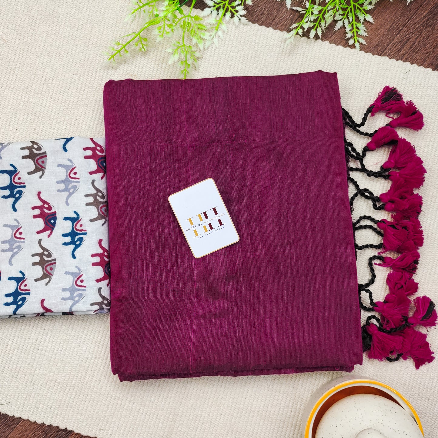 Gorgeous Grape Saree Paired With White Elephant Printed Blouse