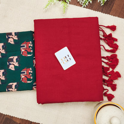 Sunset red saree with beautiful forest green  elephant printed blouse