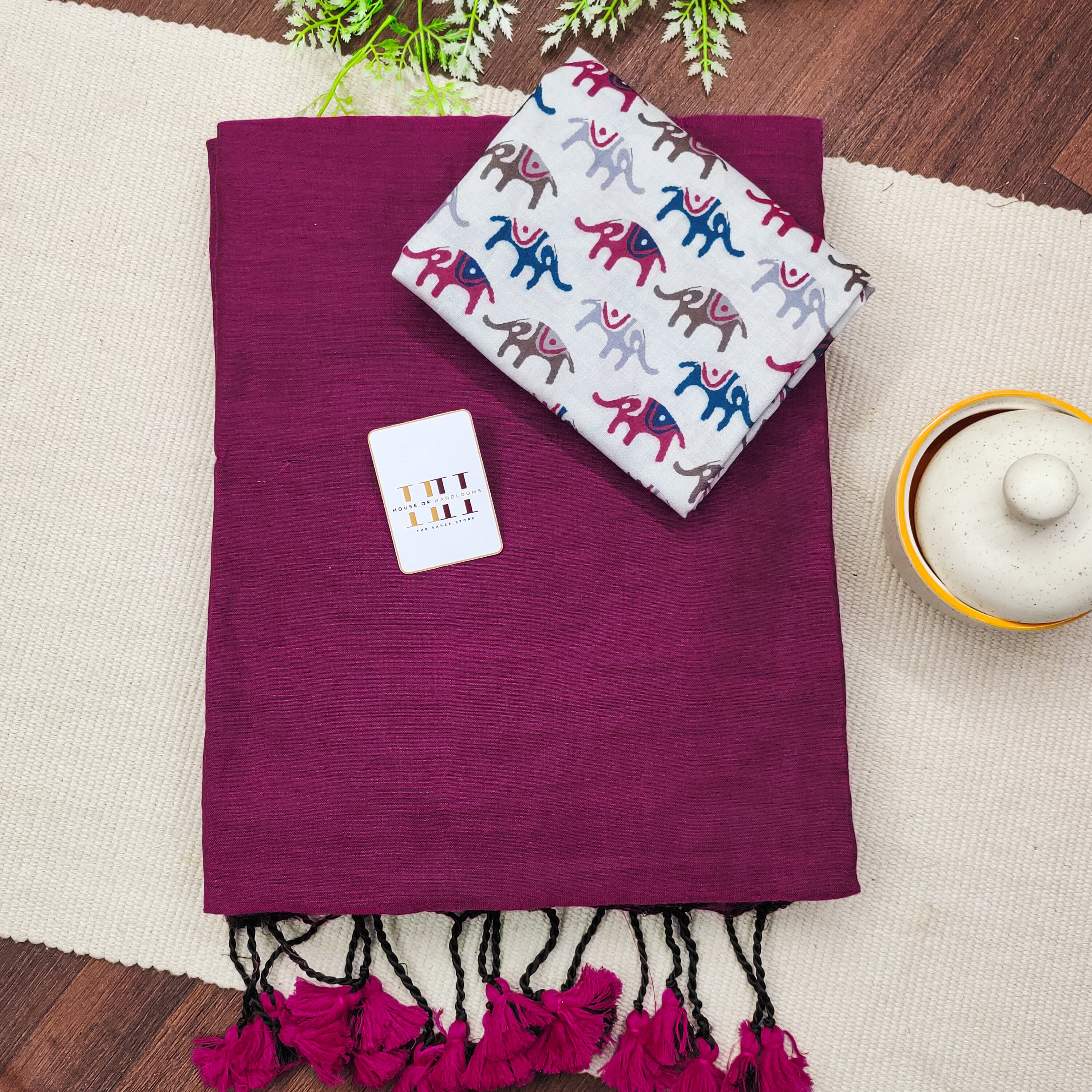 Gorgeous Grape Saree Paired With White Elephant Printed Blouse