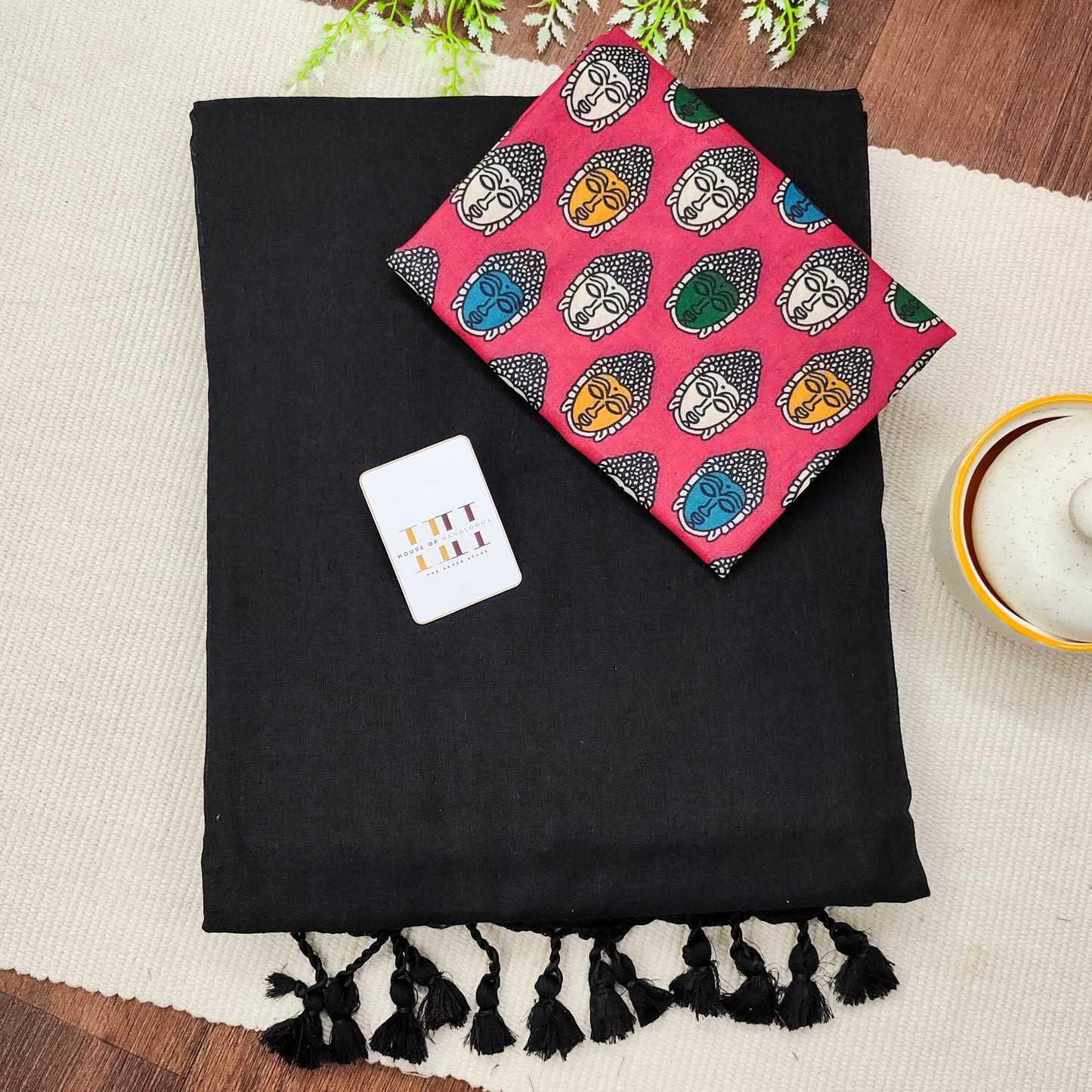 Midnight black saree with pink printed blouse