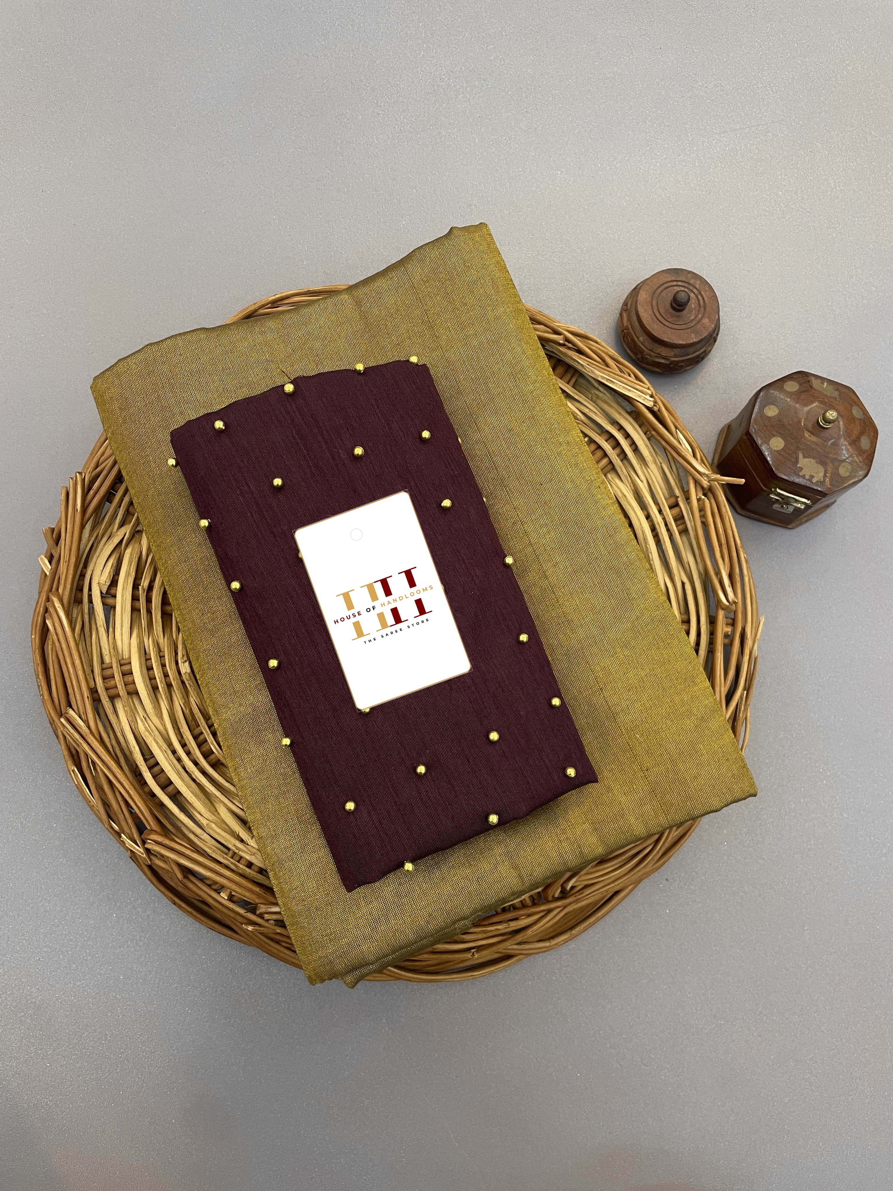 Olive Tissue cotton saree with pearl work wine blouse