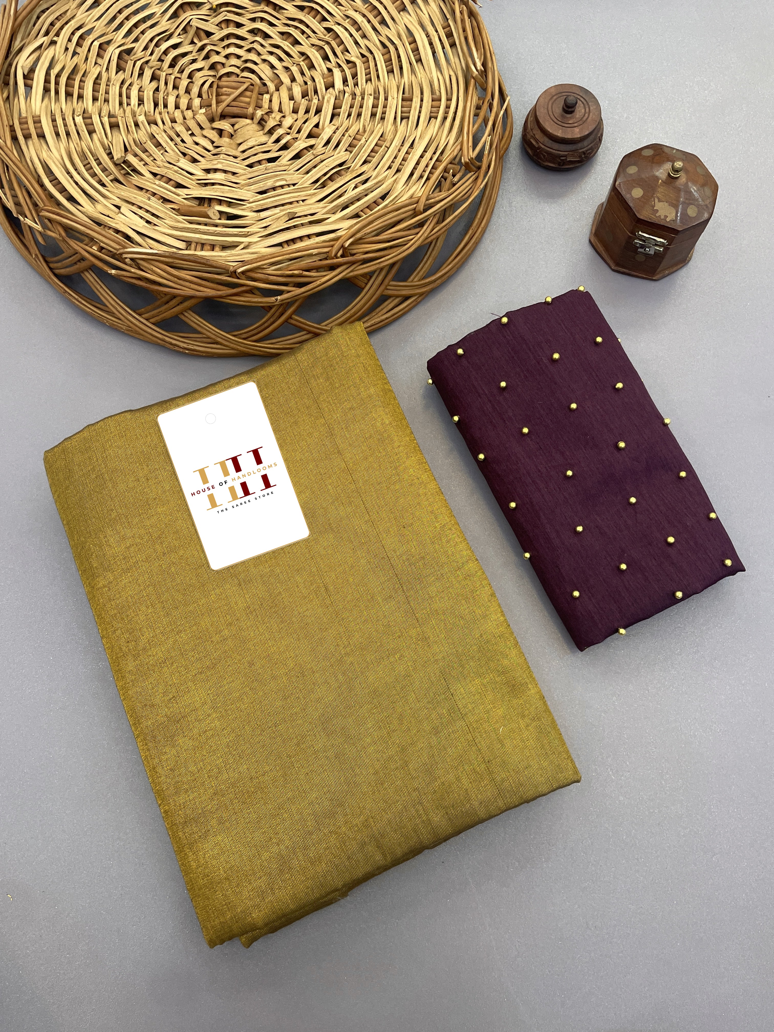 Olive Tissue cotton saree with pearl work wine blouse