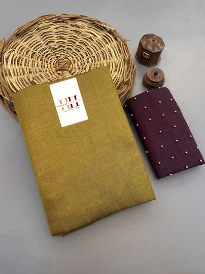 Olive Tissue cotton saree with pearl work wine blouse