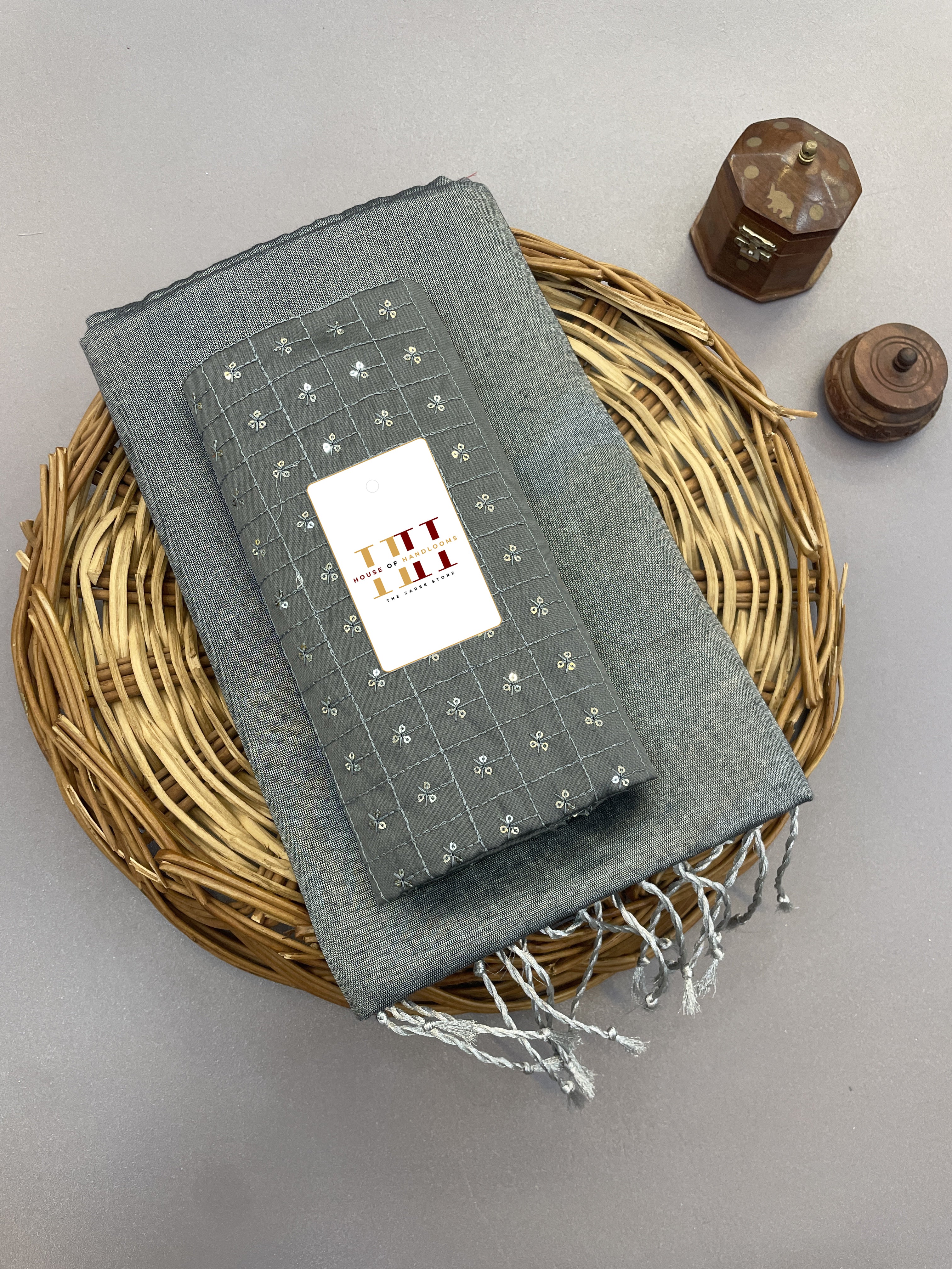 Light grey cotton tissue silk saree with beautiful thread and sequence work blouse