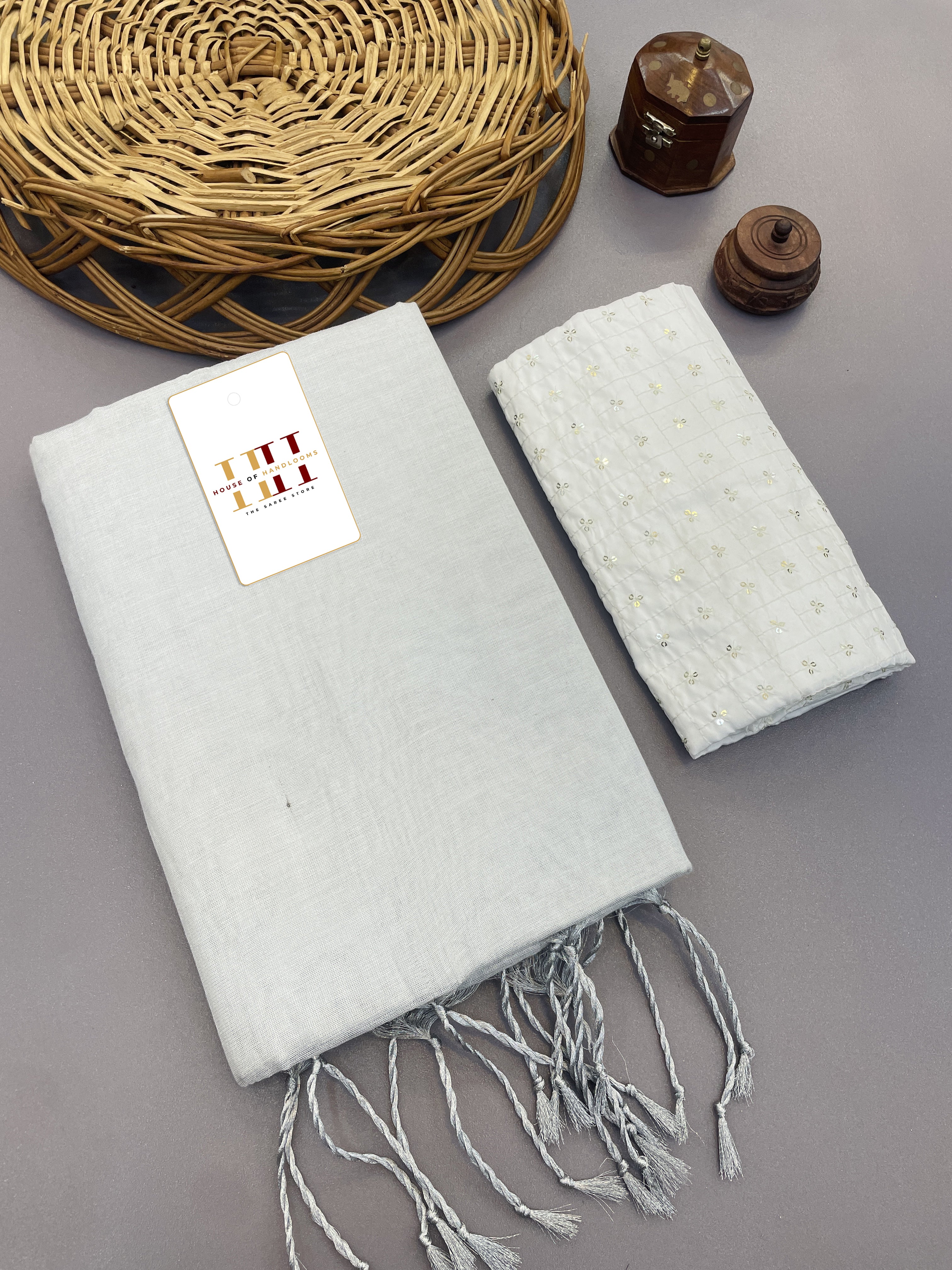 Beautiful off white cotton tissue silk saree with thread & sequence work blouse