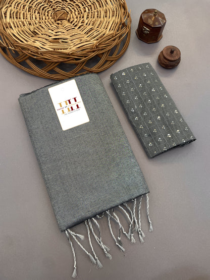 Light grey cotton tissue silk saree with beautiful thread and sequence work blouse