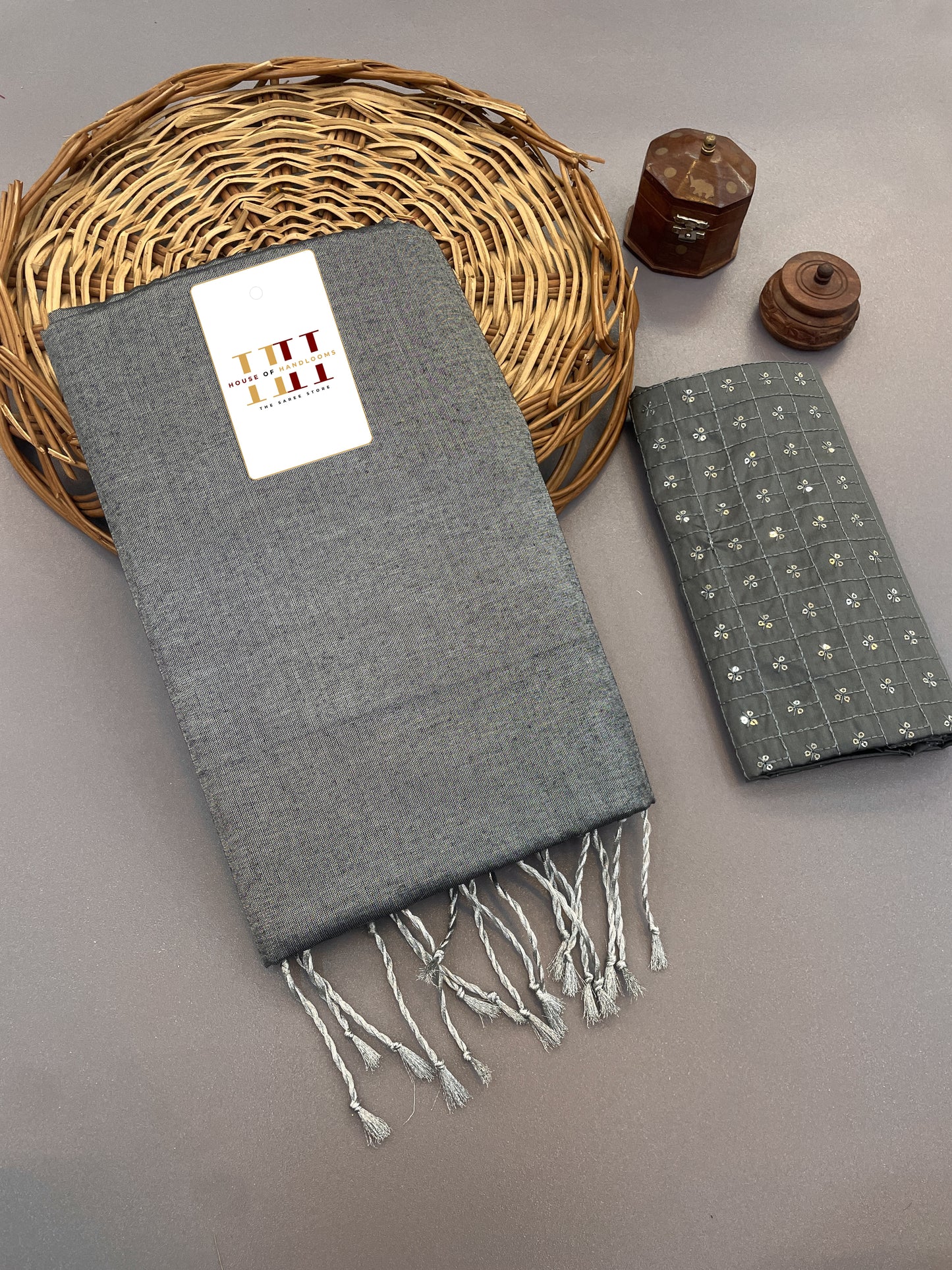 Light grey cotton tissue silk saree with beautiful thread and sequence work blouse