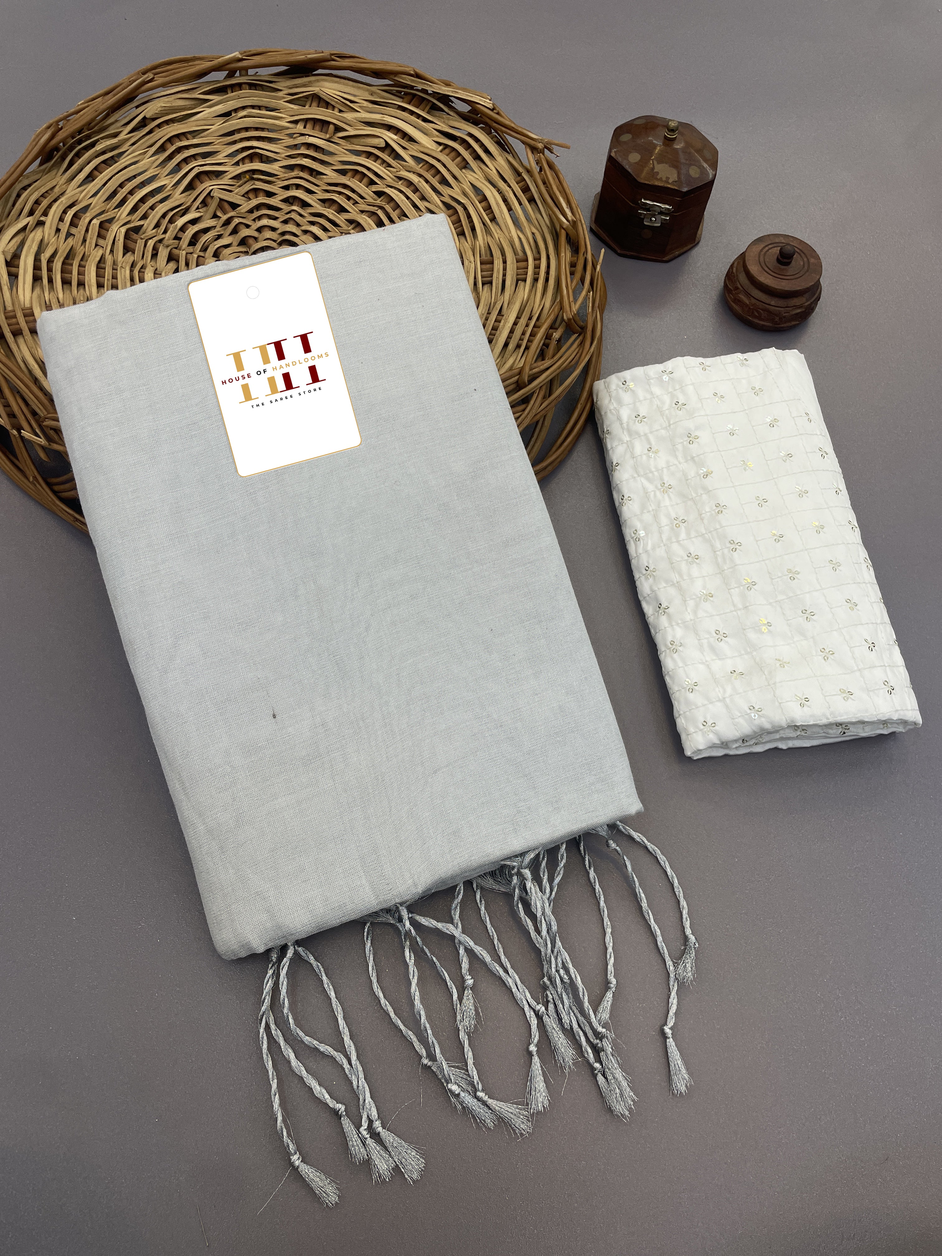 Beautiful off white cotton tissue silk saree with thread & sequence work blouse