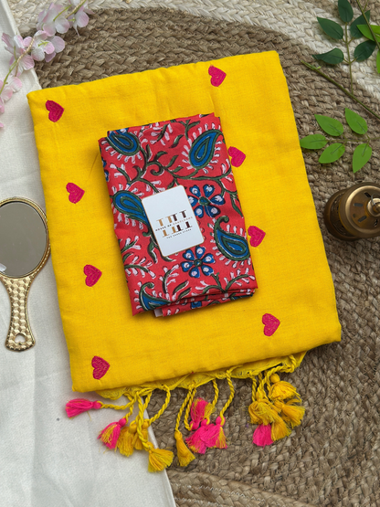 Gorgeous yellow saree with flower printed blouse