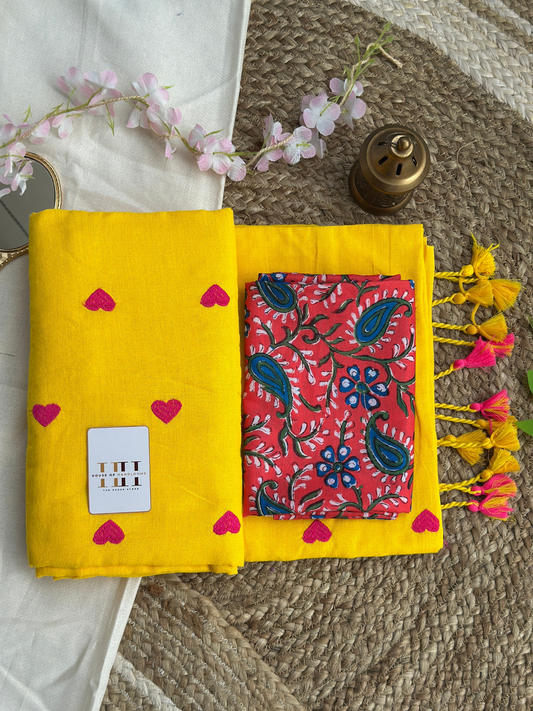 Gorgeous yellow saree with flower printed blouse