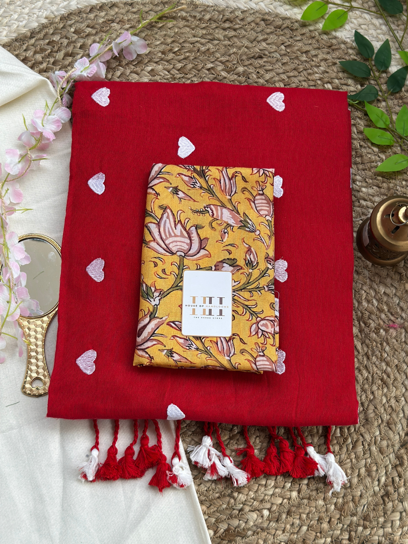 Ruby red saree with yellow floral printed blouse