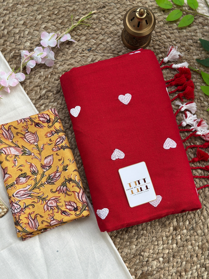 Ruby red saree with yellow floral printed blouse