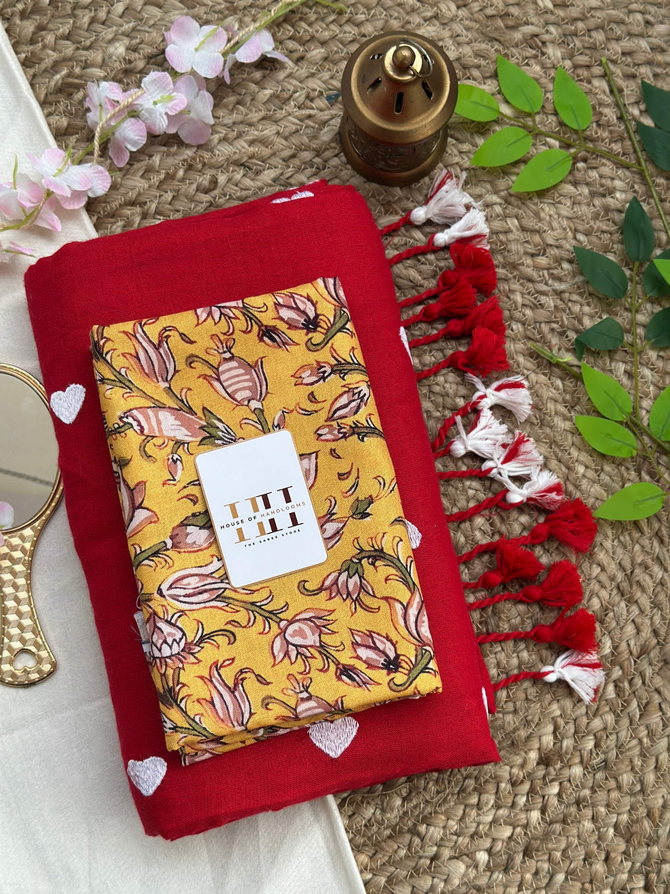 Ruby red saree with yellow floral printed blouse
