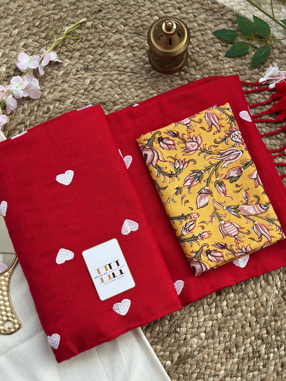 Ruby red saree with yellow floral printed blouse