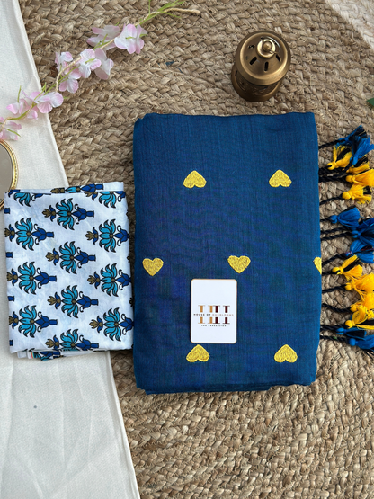 Rama blue cotton saree with white flower printed blouse
