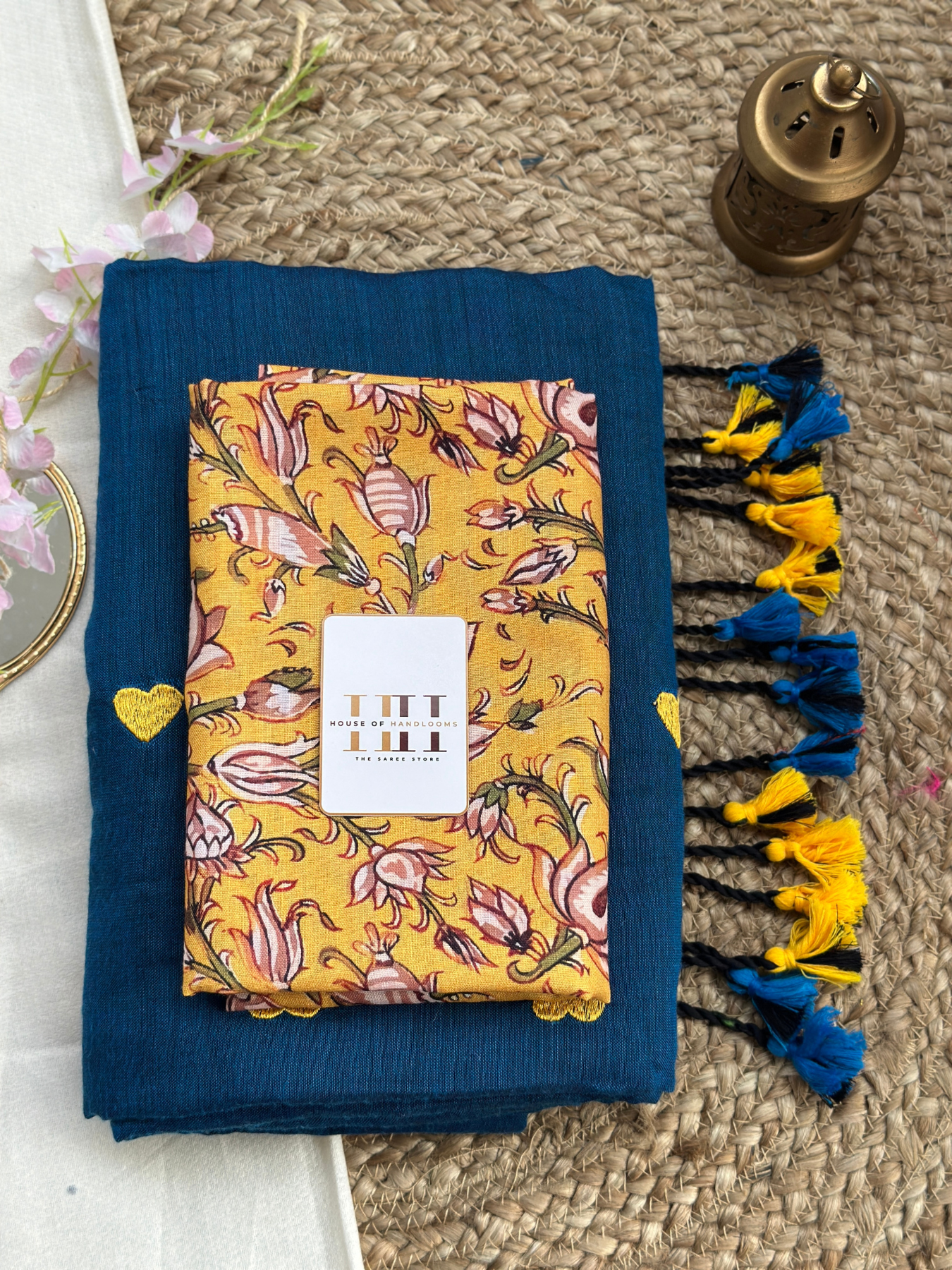 Navy blue saree with yellow flower printed blouse