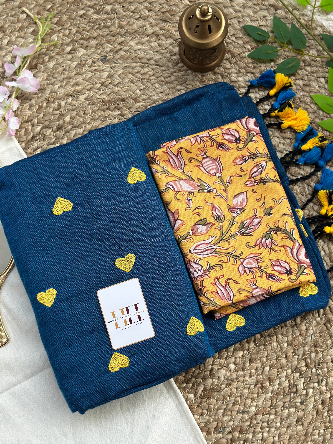 Navy blue saree with yellow flower printed blouse