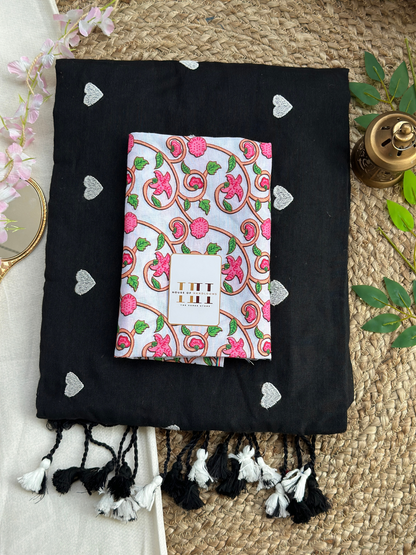 Rich black cotton handloom saree with white floral printed blouse
