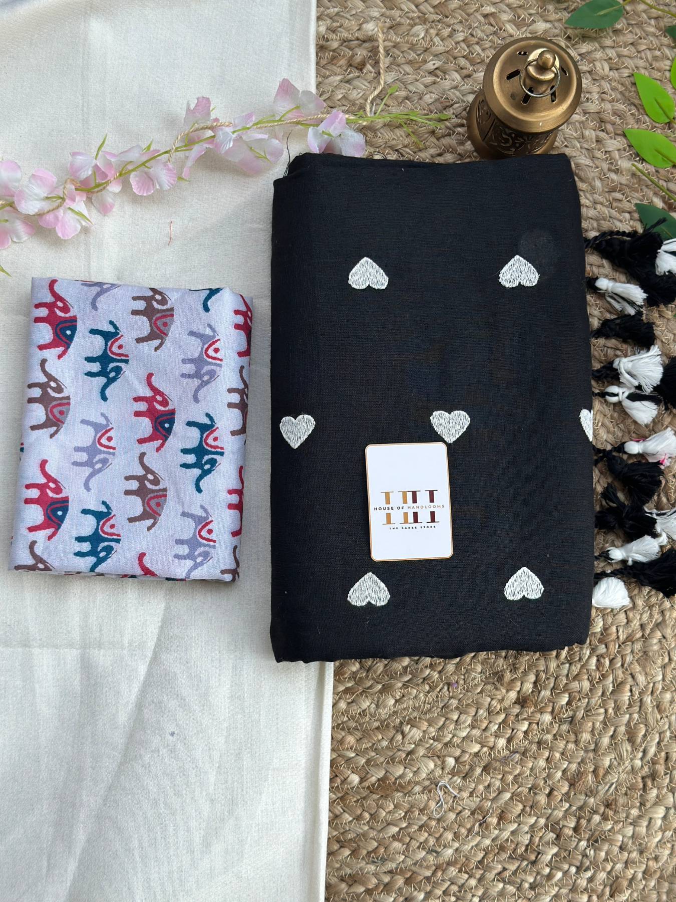 Ink black cotton handloom saree with white elephant printed blouse