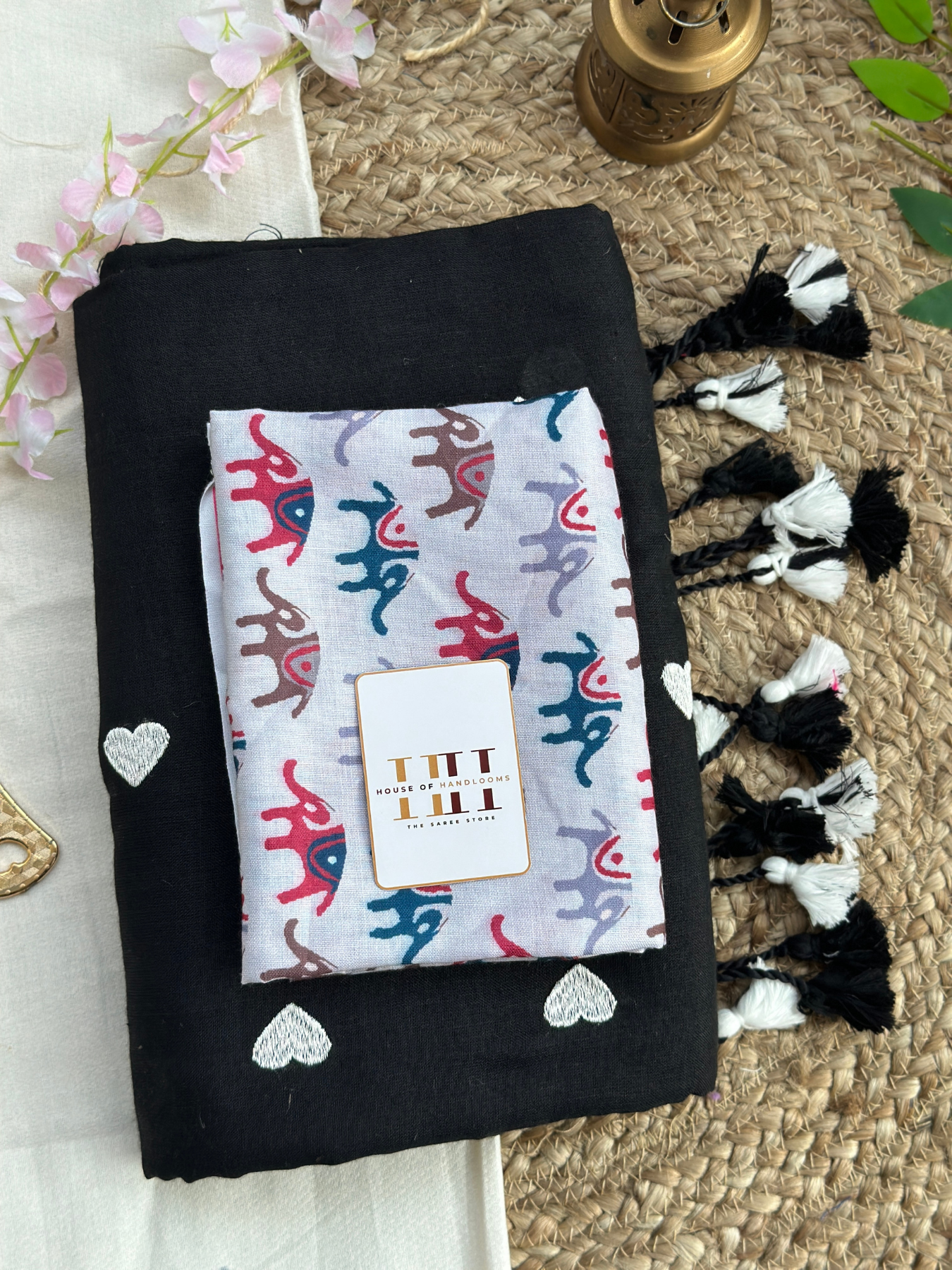 Ink black cotton handloom saree with white elephant printed blouse