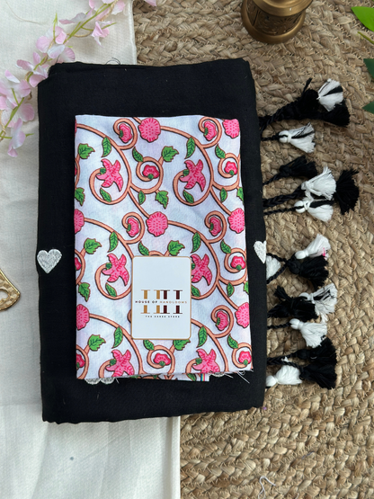 Rich black cotton handloom saree with white floral printed blouse