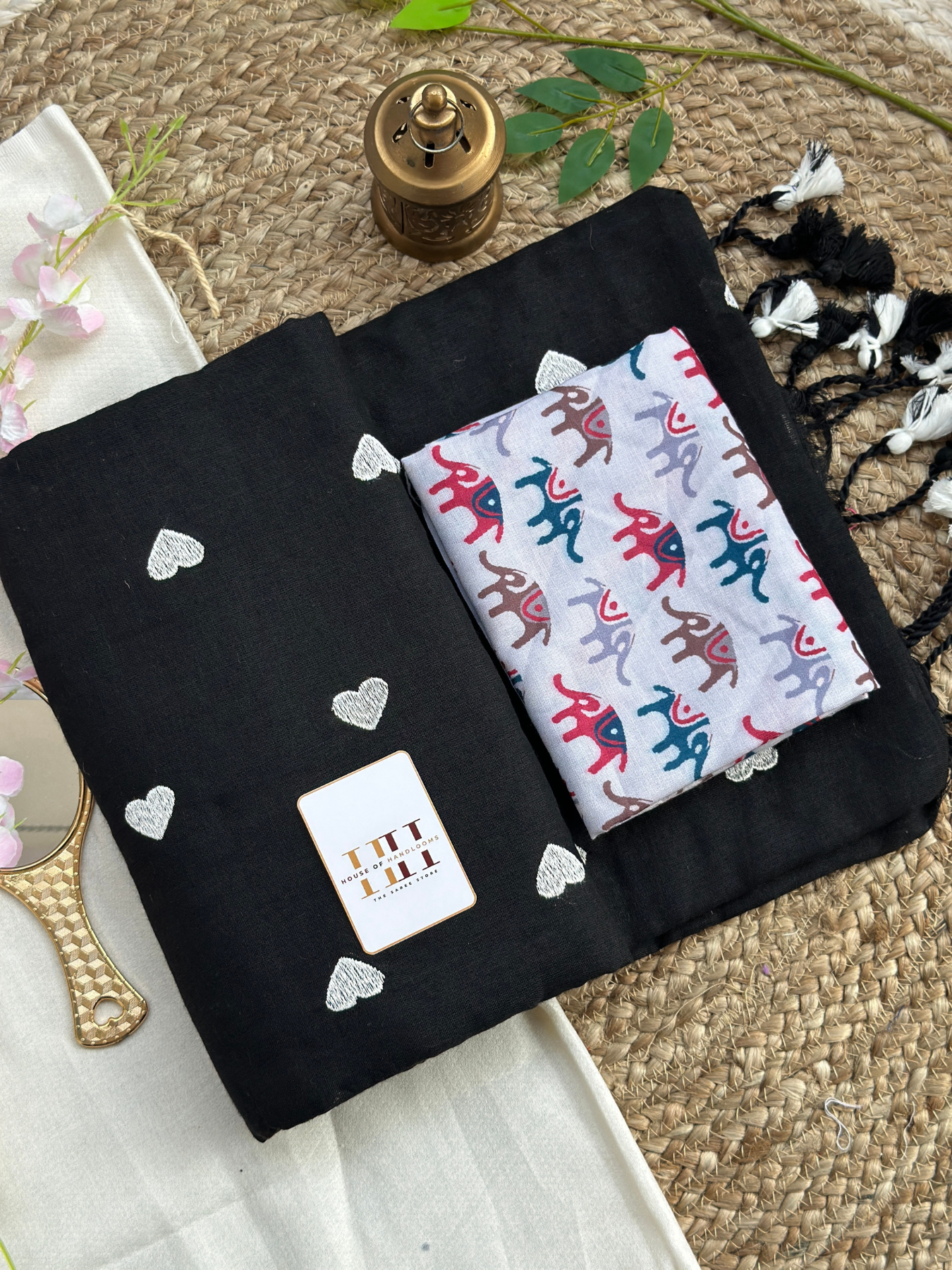 Ink black cotton handloom saree with white elephant printed blouse