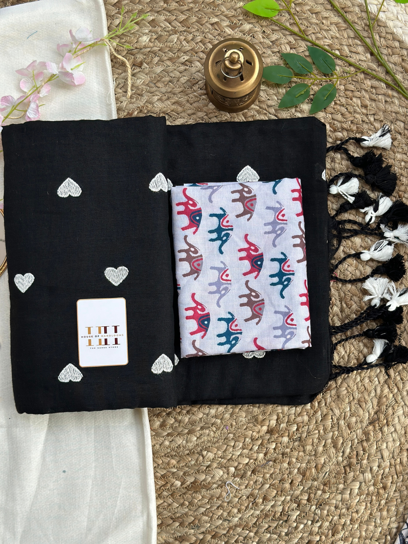 Ink black cotton handloom saree with white elephant printed blouse