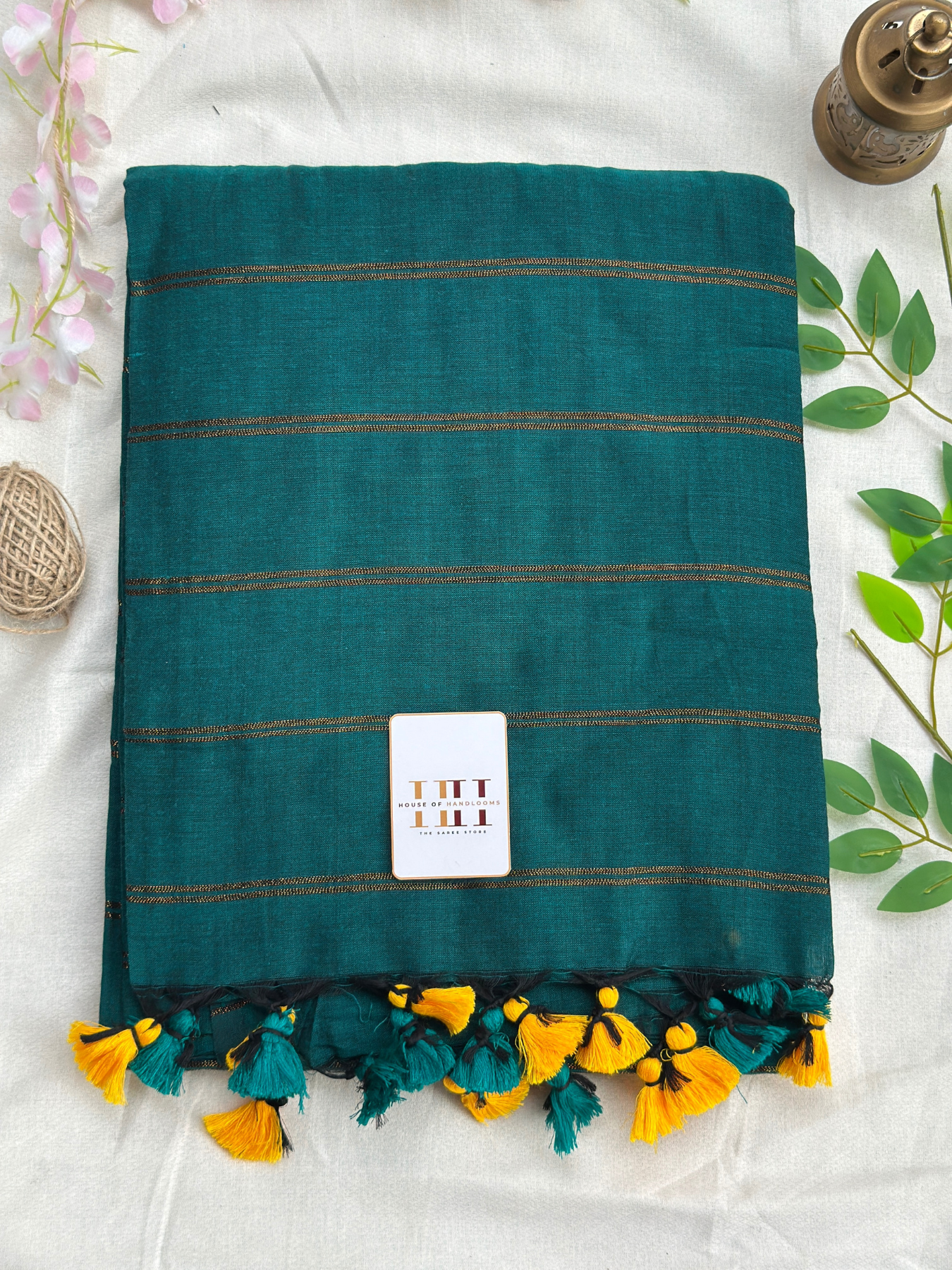 Rama green zari stirpe saree with running blouse