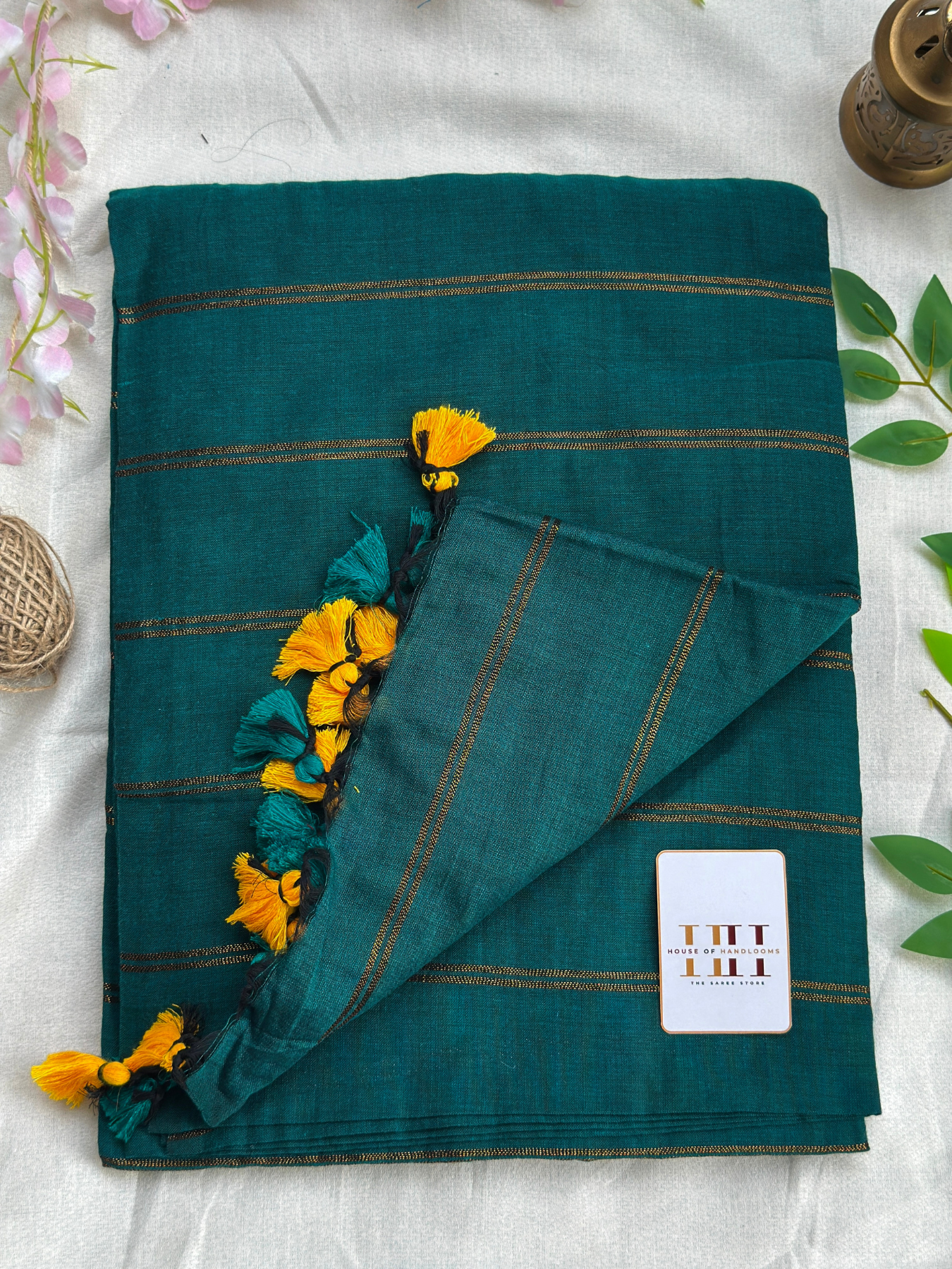 Rama green zari stirpe saree with running blouse