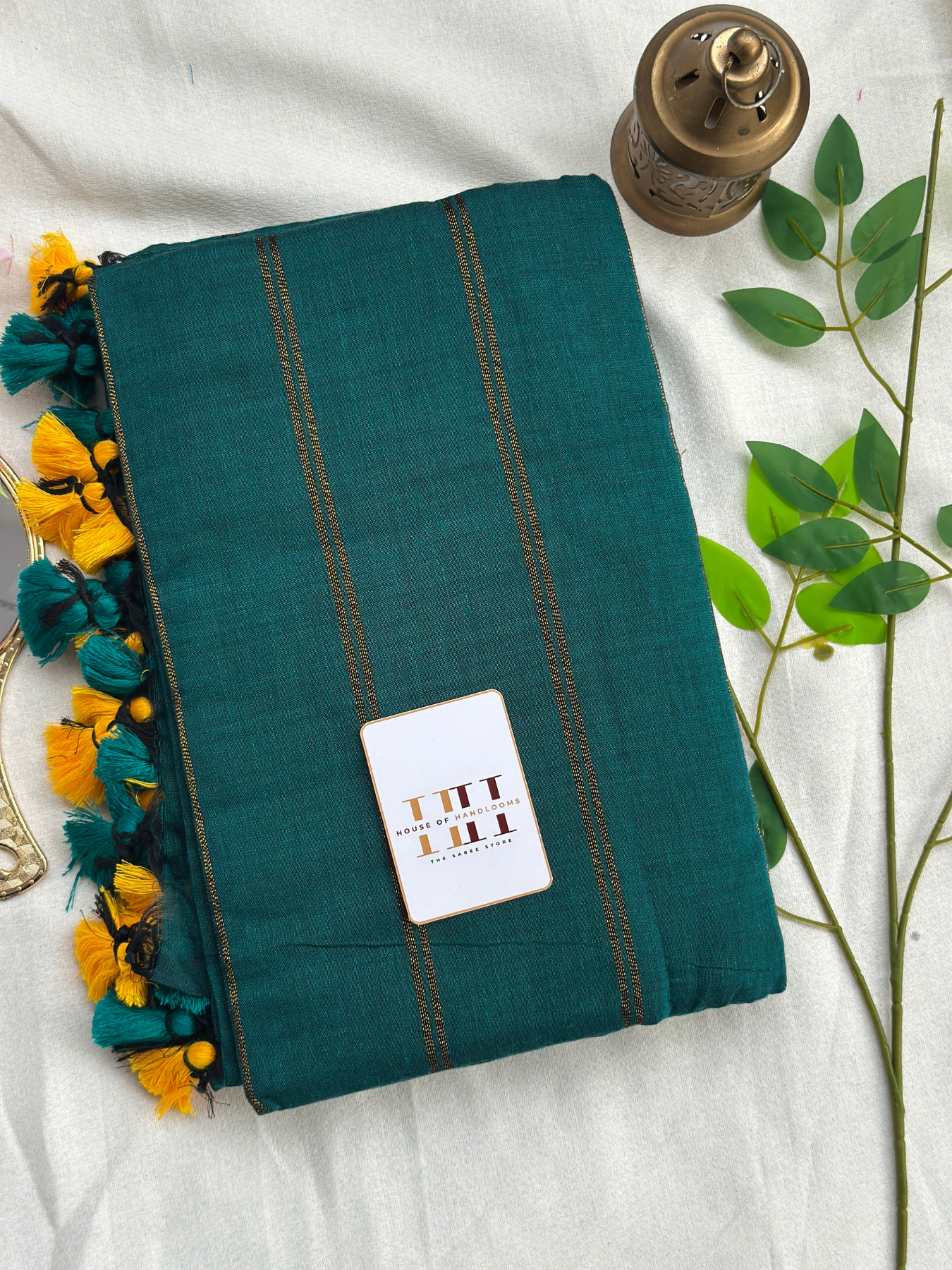 Rama green zari stirpe saree with running blouse