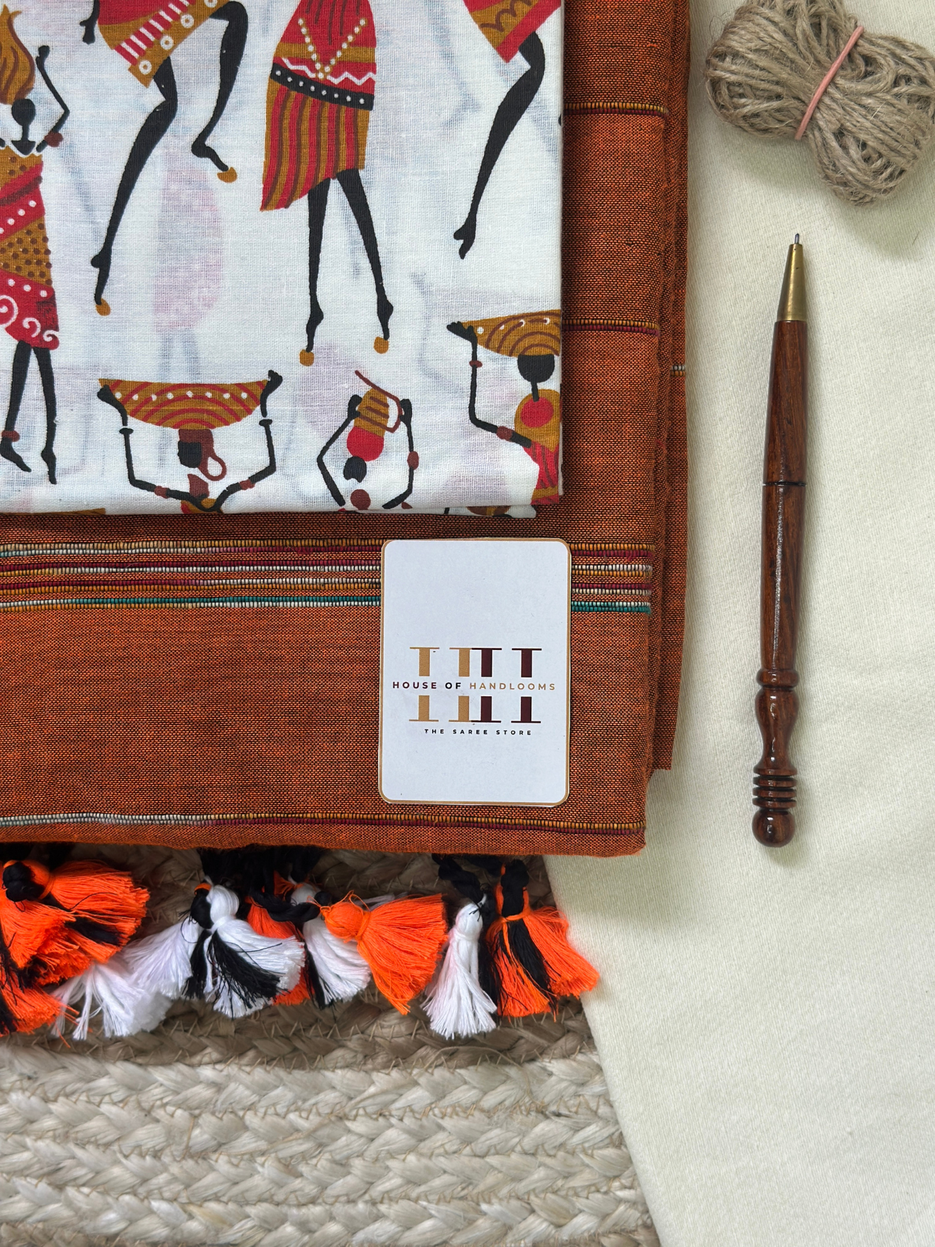 Burnt orange cotton handloom ghicha stripes saree with kalamkari printed blouse