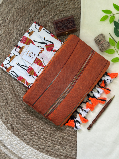 Burnt orange cotton handloom ghicha stripes saree with kalamkari printed blouse